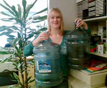 Julie Oliver with some water bottles